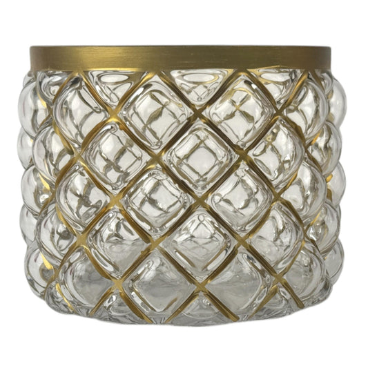 Porta velas de vidrio transparente y dorado